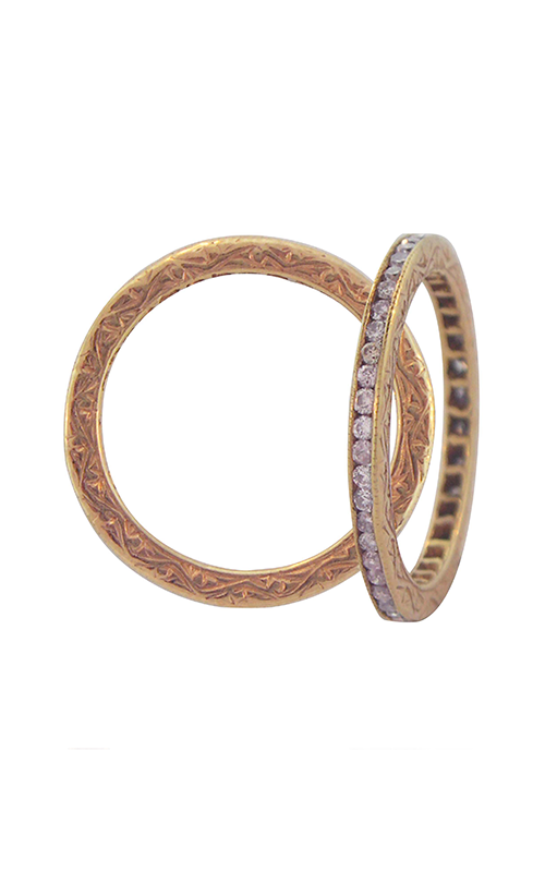 Two intricately engraved gold rings are displayed, one adorned with small diamonds.