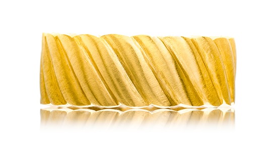 a yellow gold fashion ring featuring sculpted metal