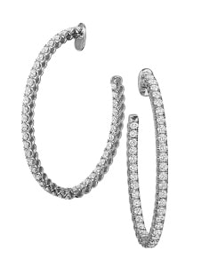 A pair of white gold, diamond hoop earrings from Jack Kelege.