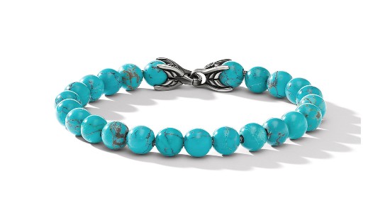 a turquoise beaded bracelet featuring silver detail