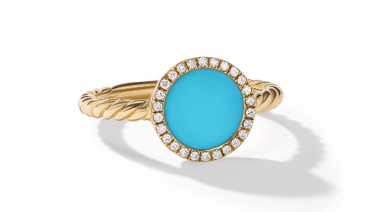 a yellow gold fashion ring featuring bright turquoise and a halo of diamonds