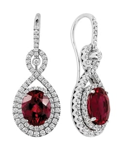 A pair of diamond-accented ruby drop earrings.