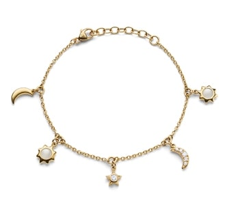 A gold bracelet with celestial motifs and gemstone accents.