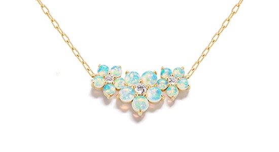 a yellow gold necklace featuring opals arranged in floral shapes with diamonds at their center
